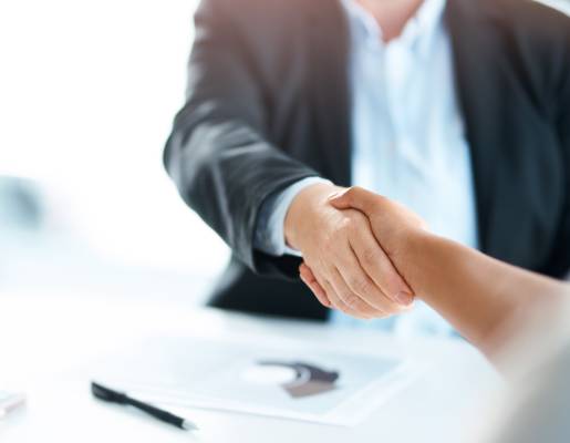 Lawyer Shaking Hands with a Client
